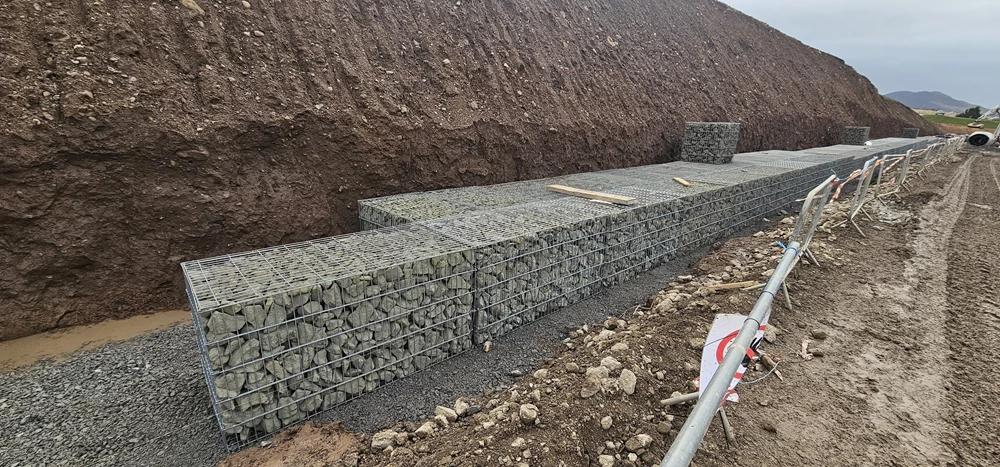 Completed prefilled gabion retaining wall at Whitehills, Shawfair
